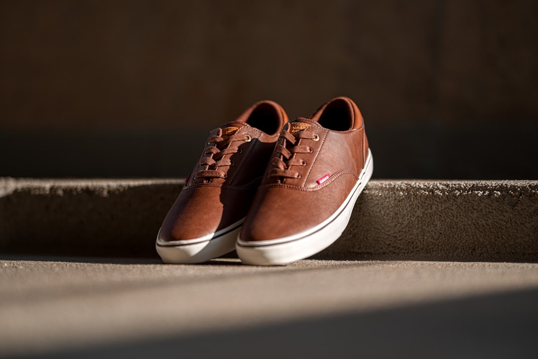 pair of brown Levi's leather low-top lace-up sneakers
