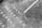 Text is painted on a rough and worn concrete surface, appearing to guide the viewer towards a reception area. An arrow and words such as 'this way to reception lockers marks' are clearly visible.