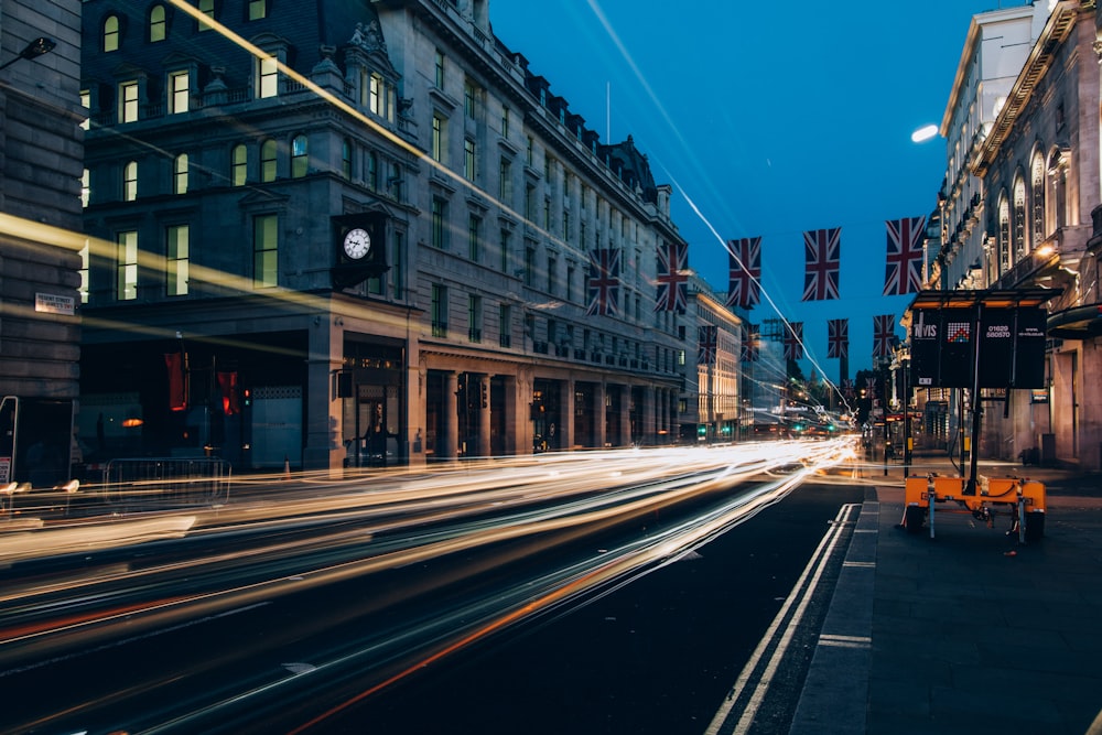 time lapse photography of vehicles on road