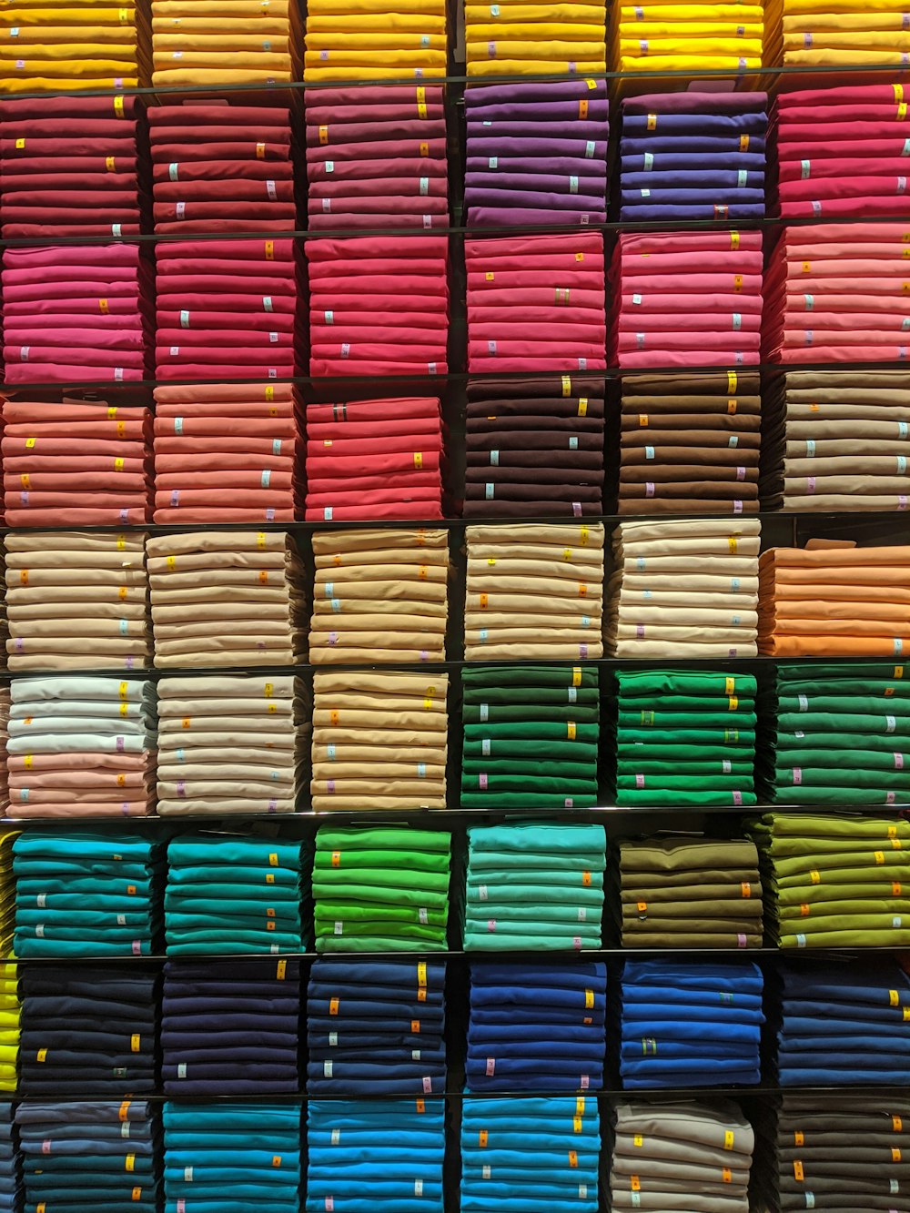 multiple cube storage of assorted-color textiles