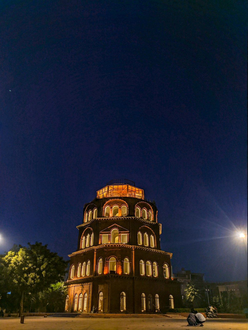 a very tall building lit up at night