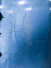 Close-up of tempered glass showing stress patterns under polarized light.