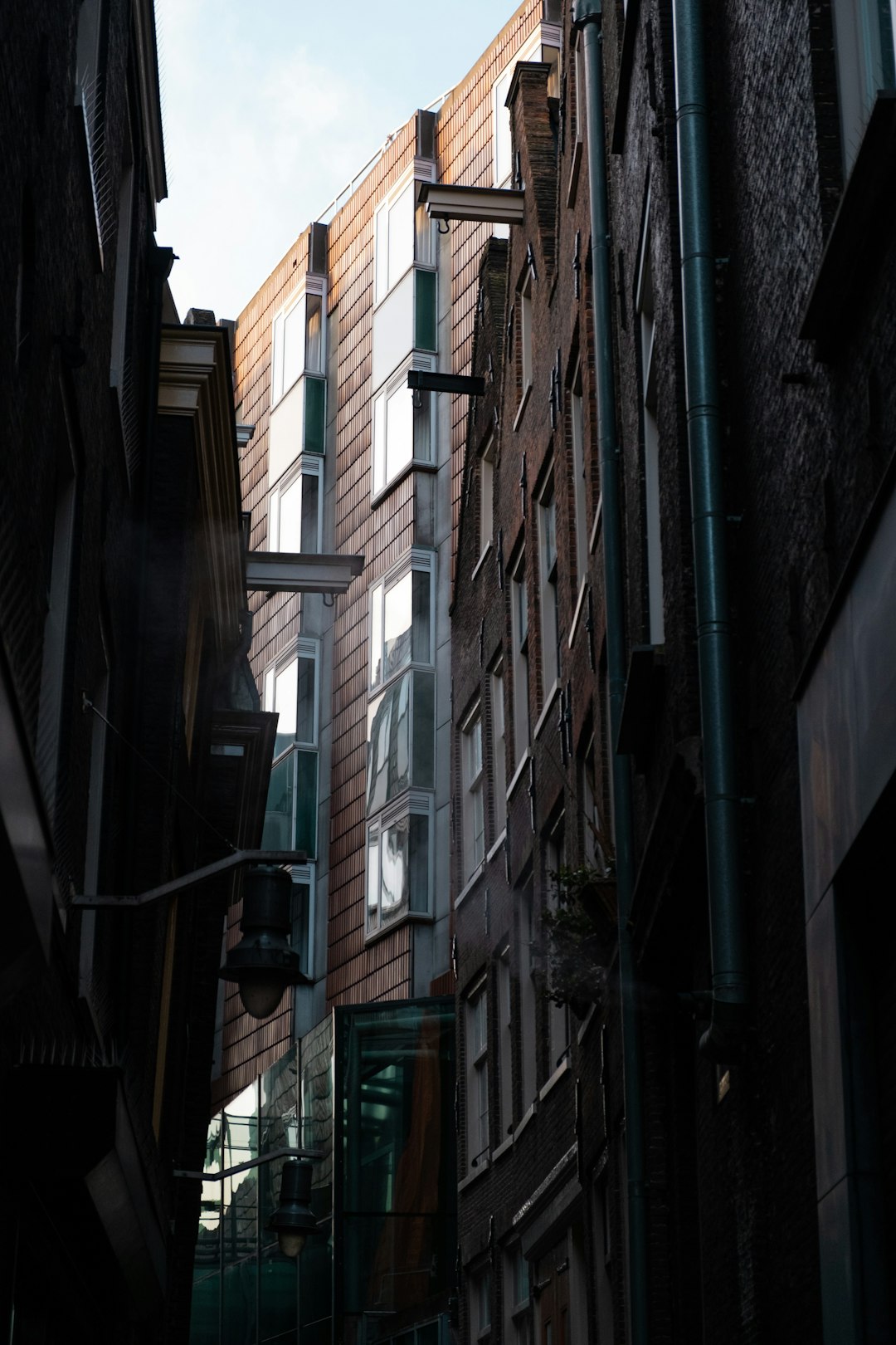 low-angle photography of brown high-rise buildings during daytime