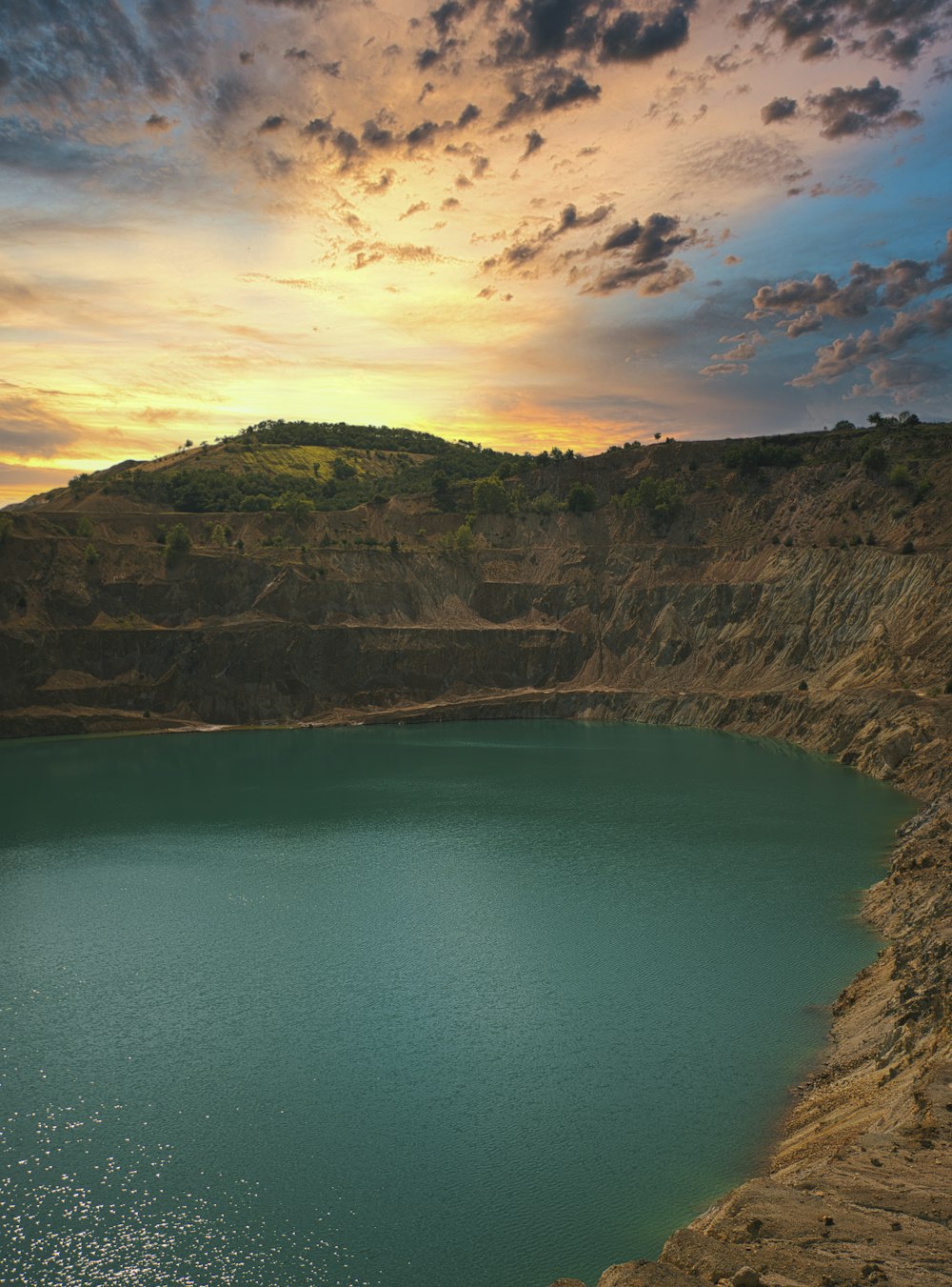 lake near cliffs