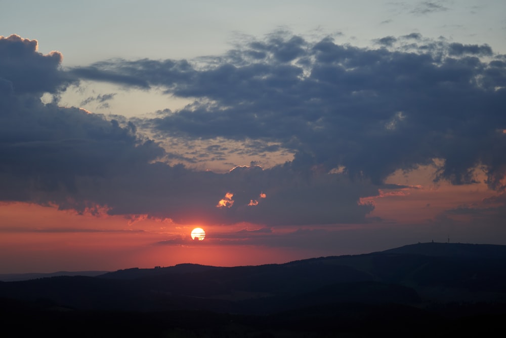 silhouette of mountain during golden hour