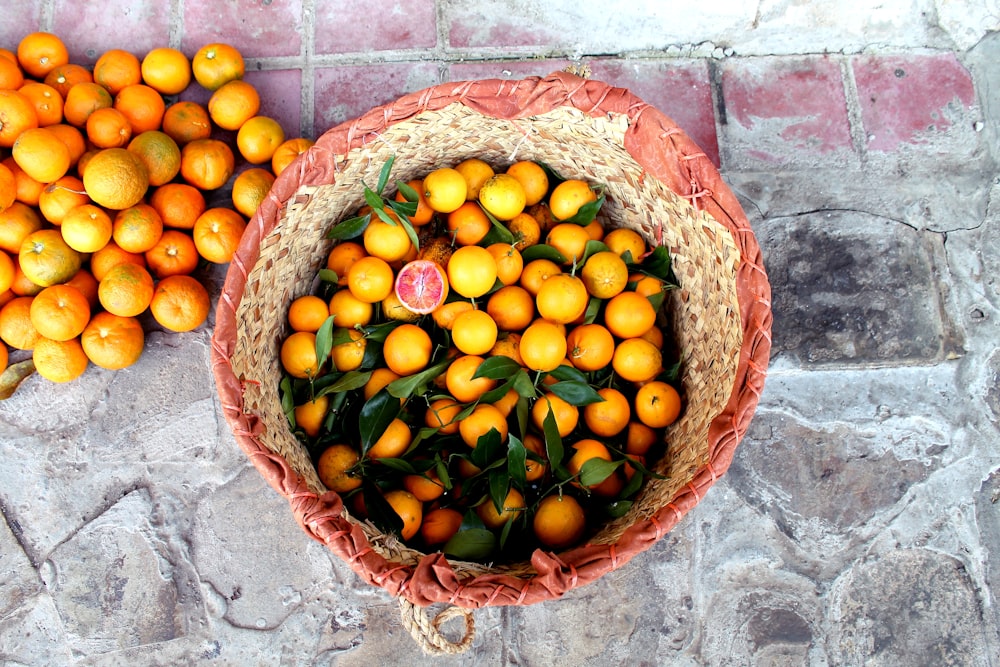 basket of orange fruits