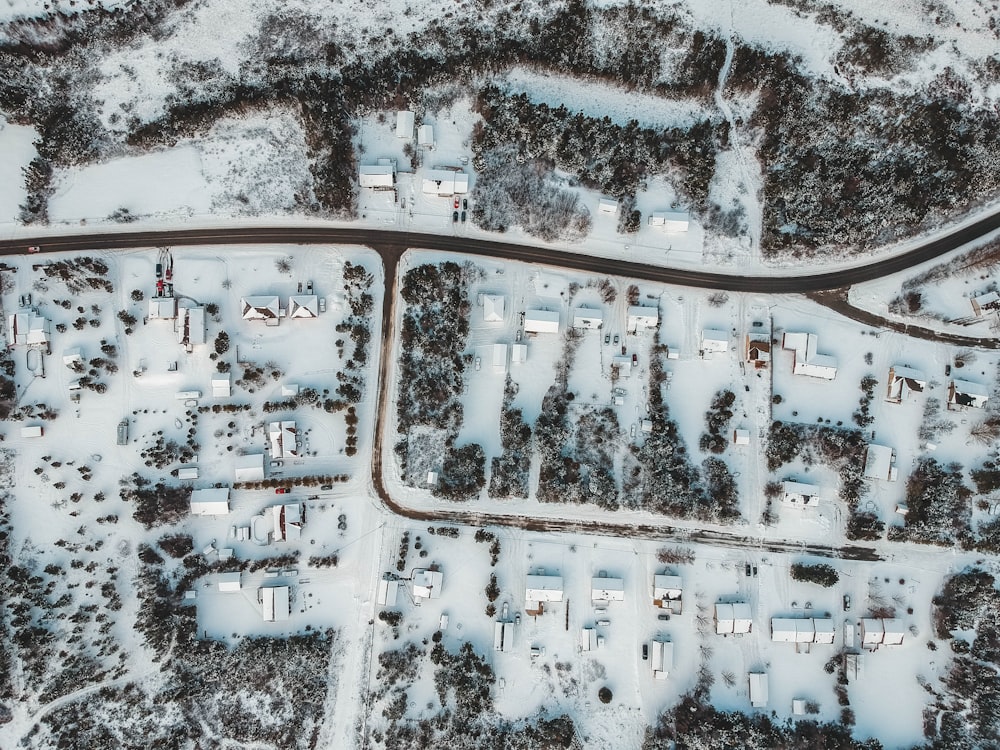 aerial photography of snow covered houses