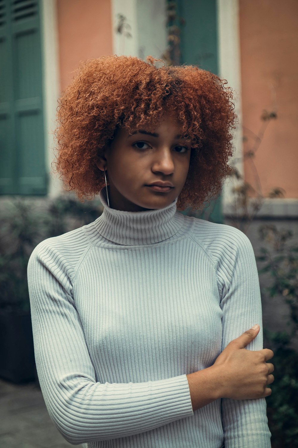 woman wearing white turtle-neck sweater