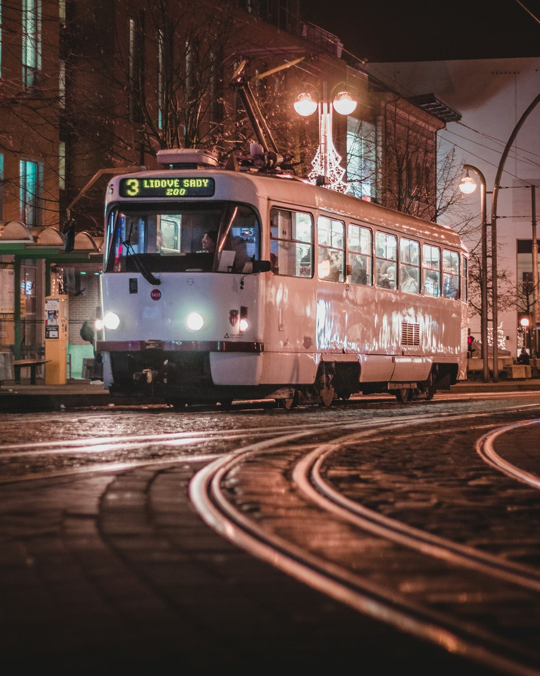 white tram at night