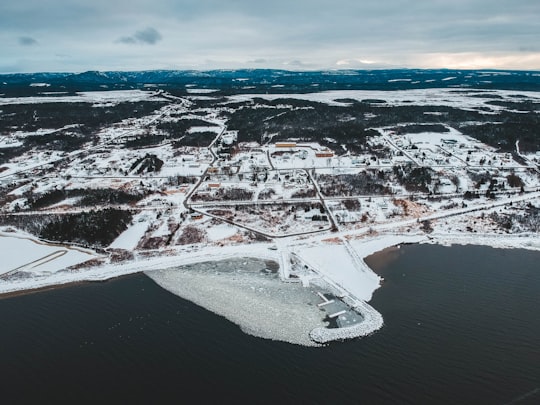 aerial photography of snowy ground near sea in Saint George's Canada