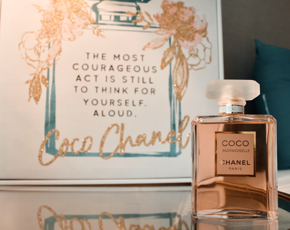 Chanel Coco Paris fragrance bottle on clear surface