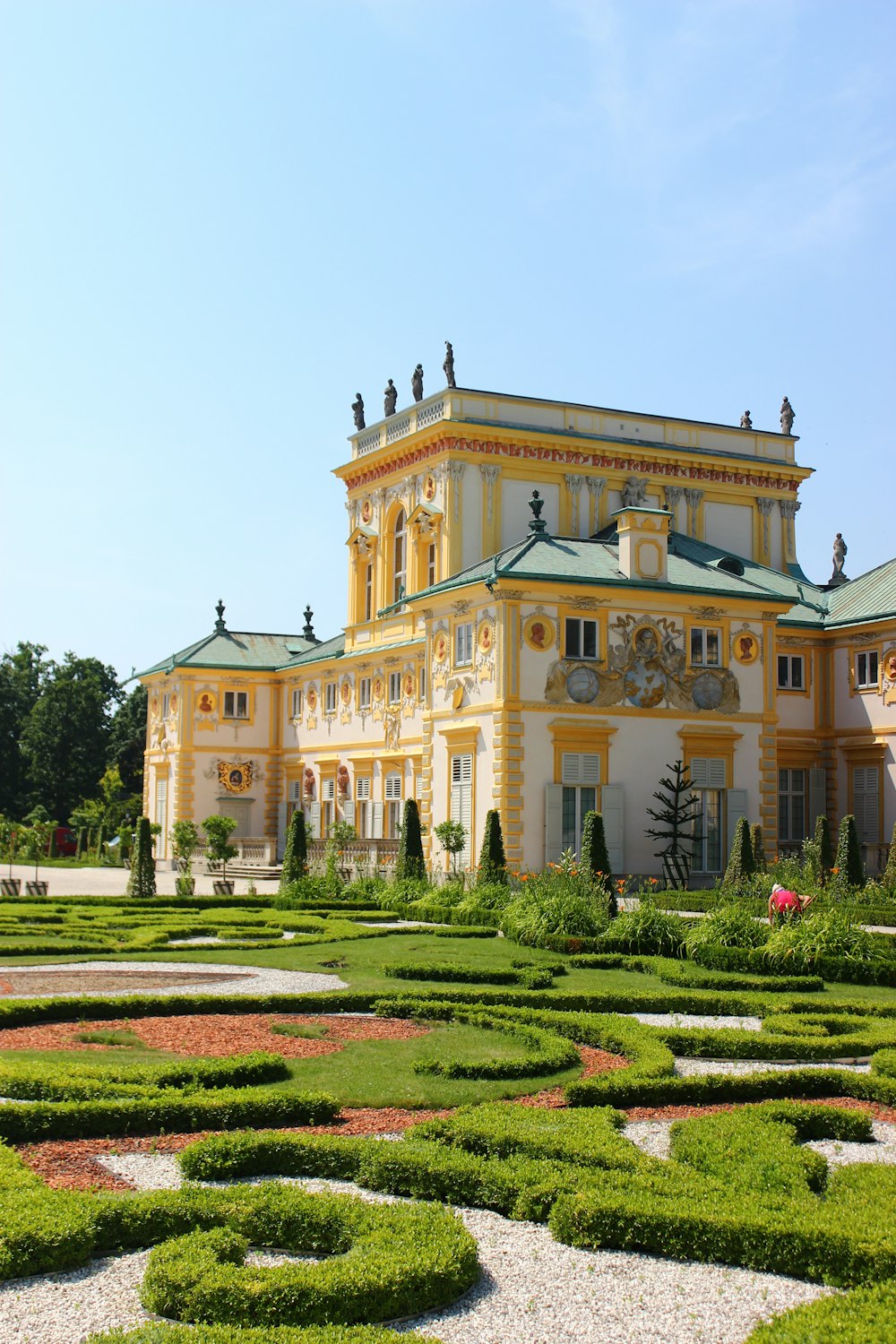 mansion near garden during day