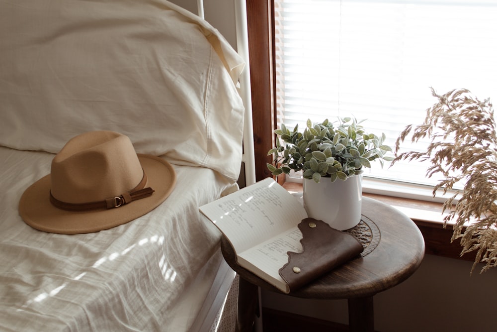 cowboy hat on bed