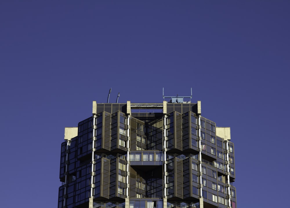 a very tall building with a clock on the top of it