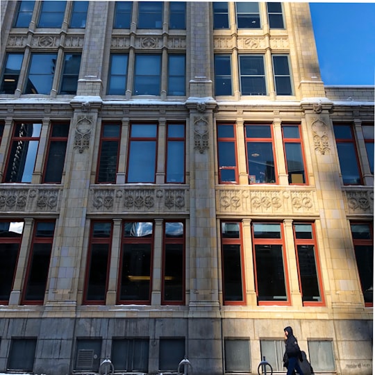 brown and white concrete building in 299 Queen Street West Canada