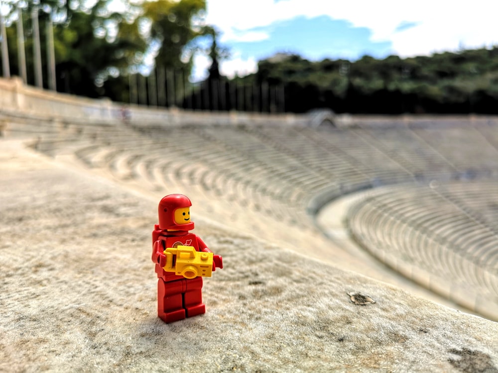 red and yellow Lego minifig toy\