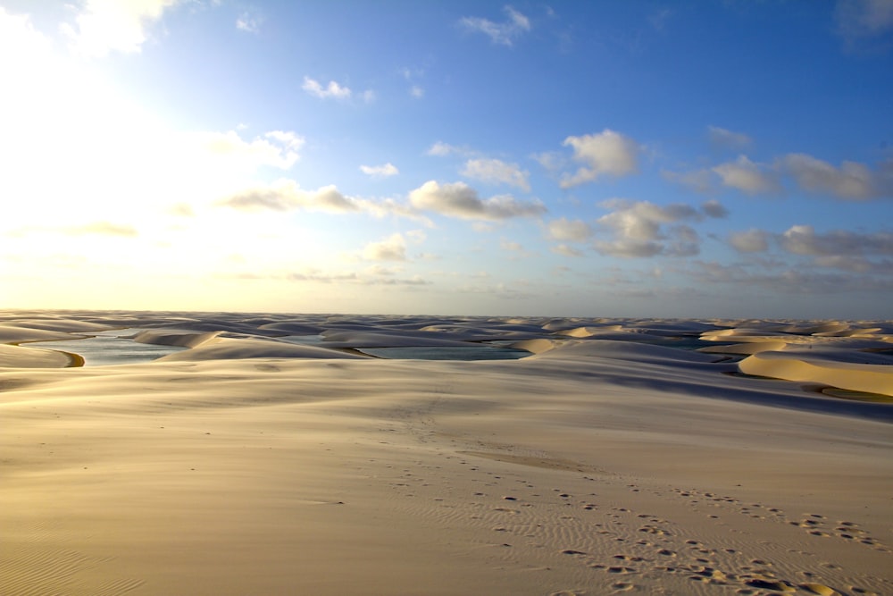 desert under white and blue sky