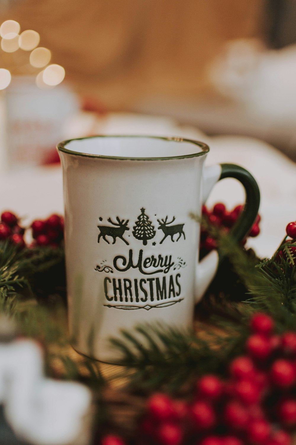 white and green Christmas print enamel mug