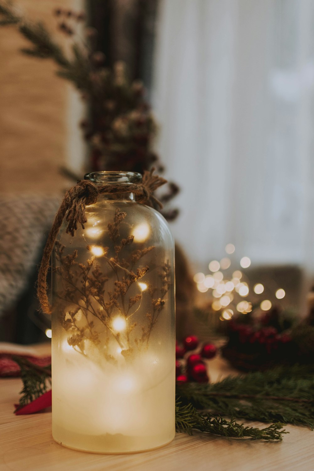 clear glass jar with string lights