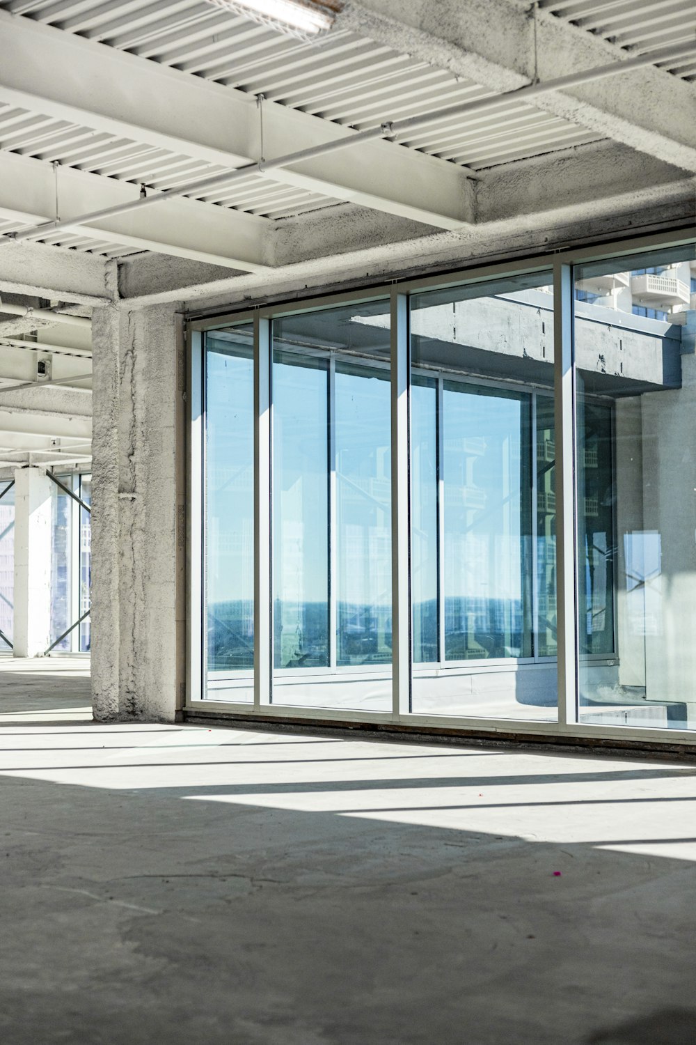 clear glass walled high-rise building