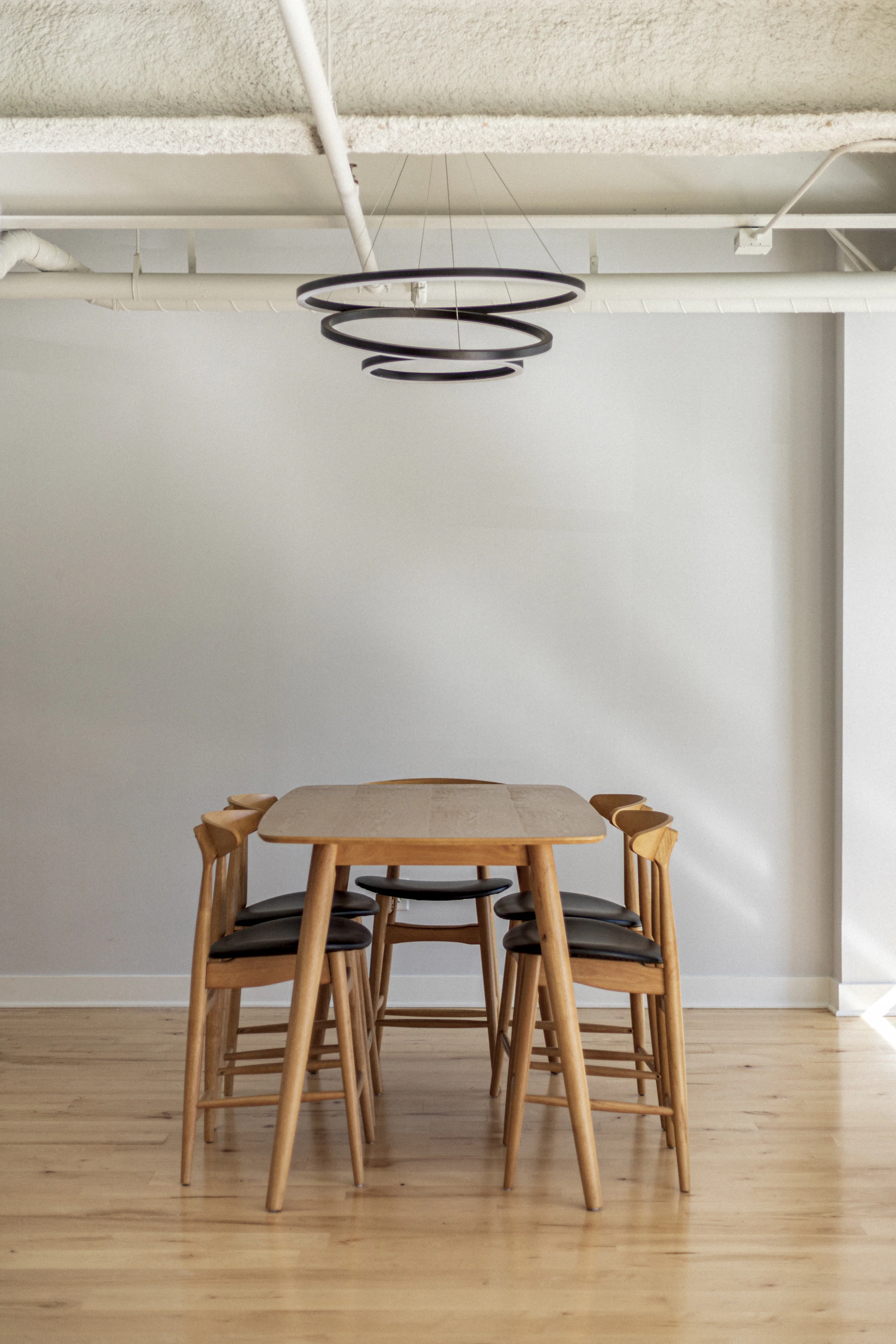 Tala Oval Dining Table in honey solid teak