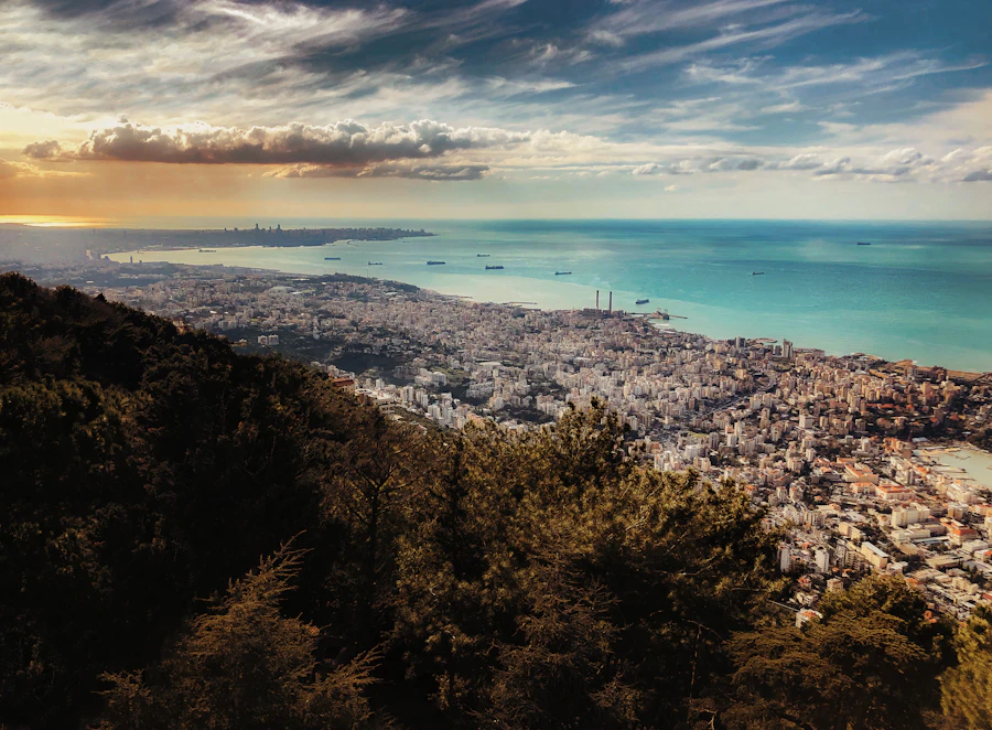Aerial view of the Lebanese mountains meeting the coast, a landscape locals travel across for online dating in Lebanon