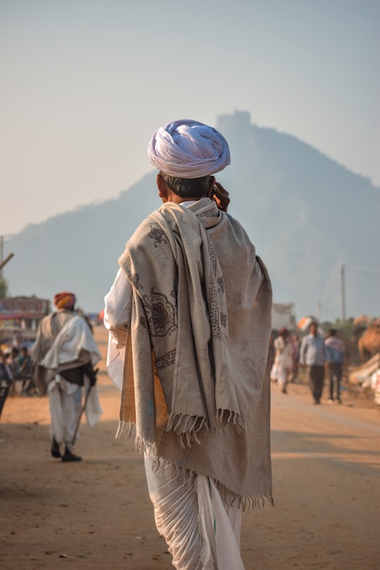man wearing white turban in Pushkar India