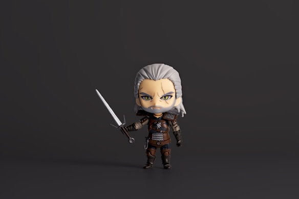 A stylized chibi figure with grey hair and a beard is holding a sword in a defensive stance. The character is dressed in fantasy armor with intricate details and has an intense expression.