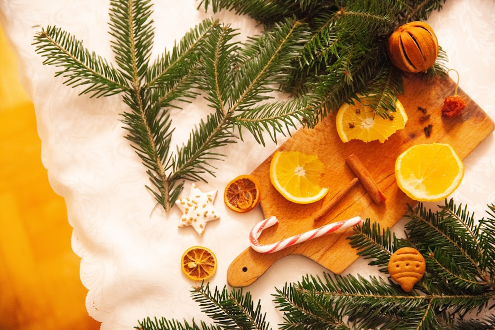 sliced lemons on brown board