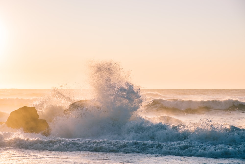 waves crashing on coastal rocks