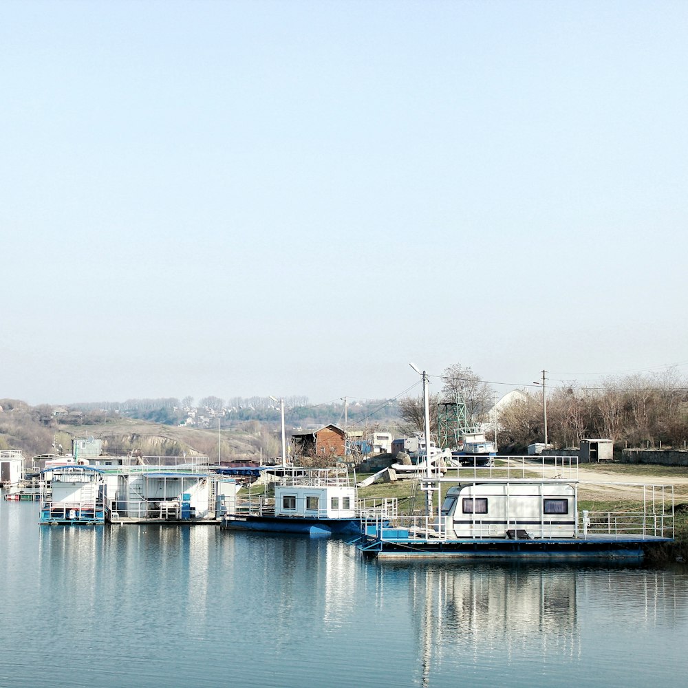 boats on dock during daytime