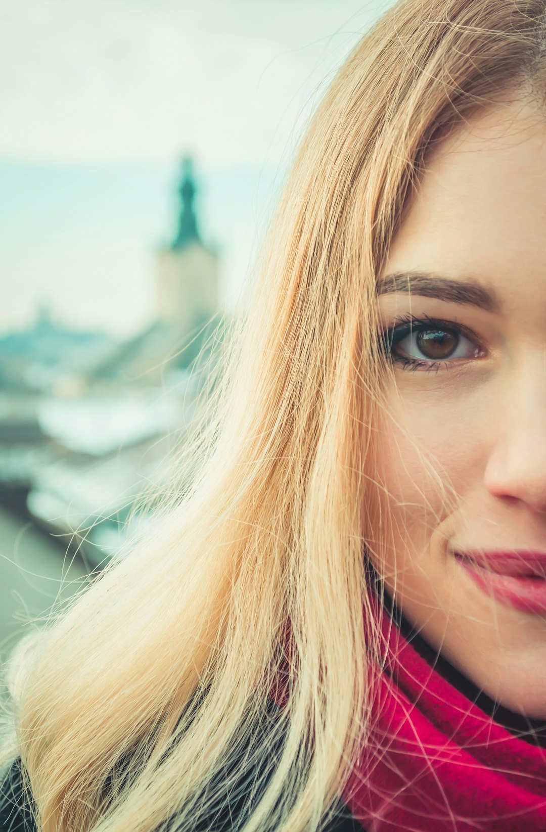selective focus photography of woman wearing pink scarf