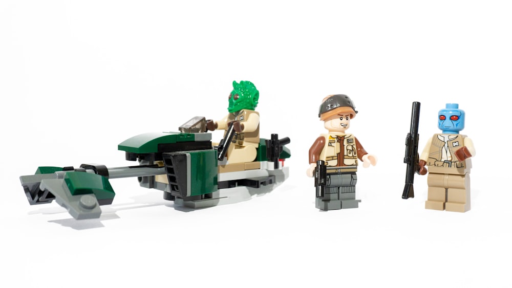 three LEGO toys