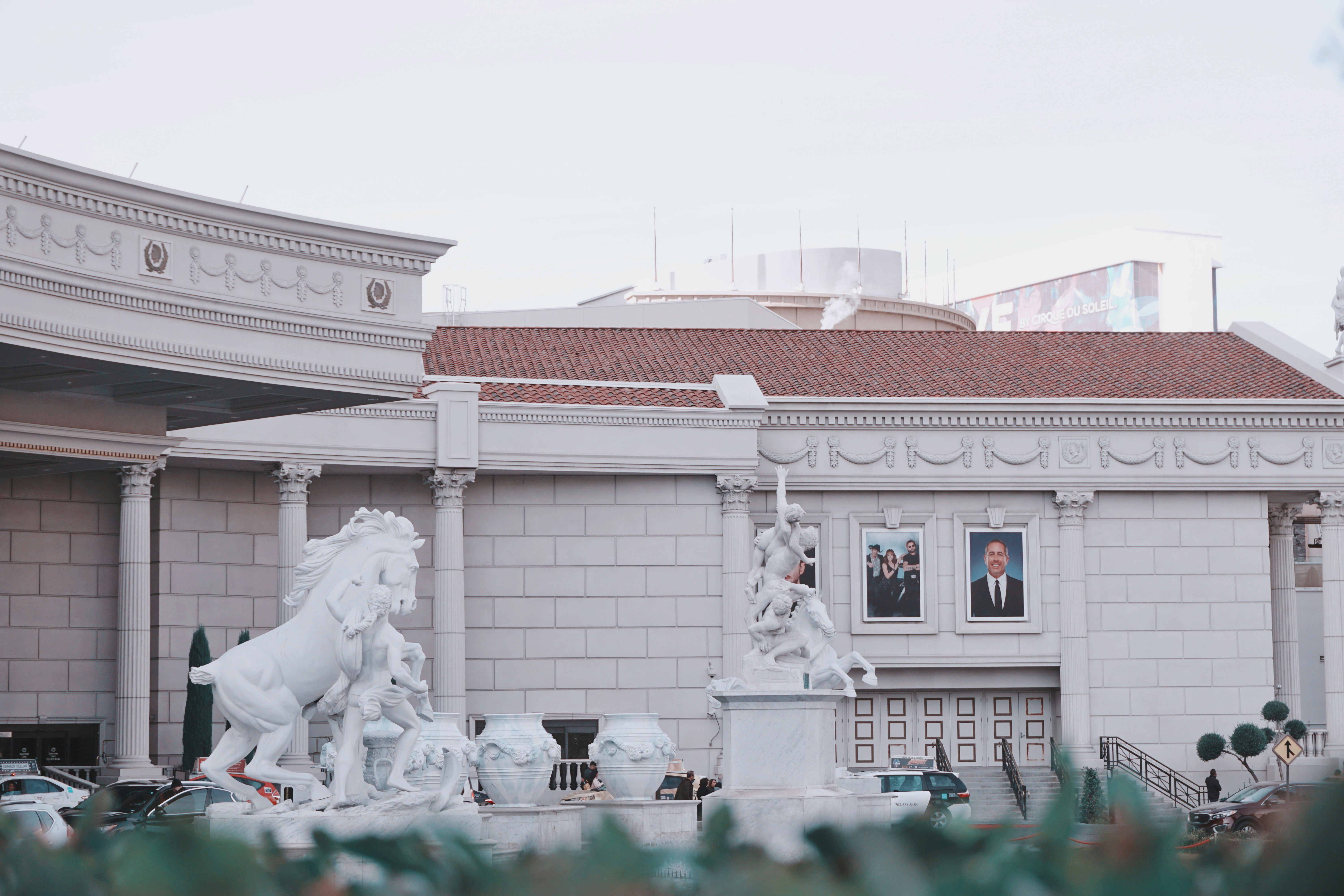 statues in front of building
