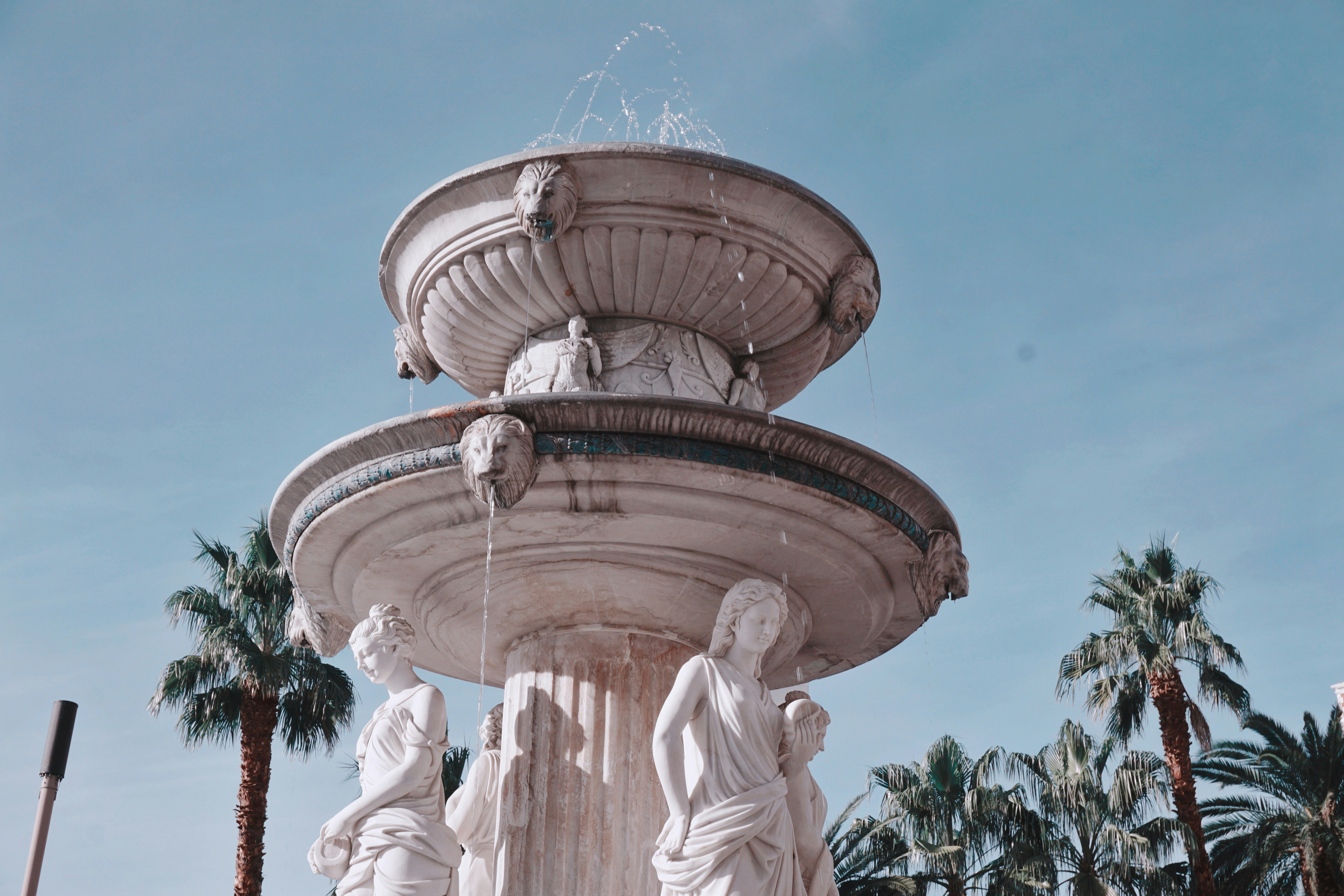 gray concrete water fountain during daytime