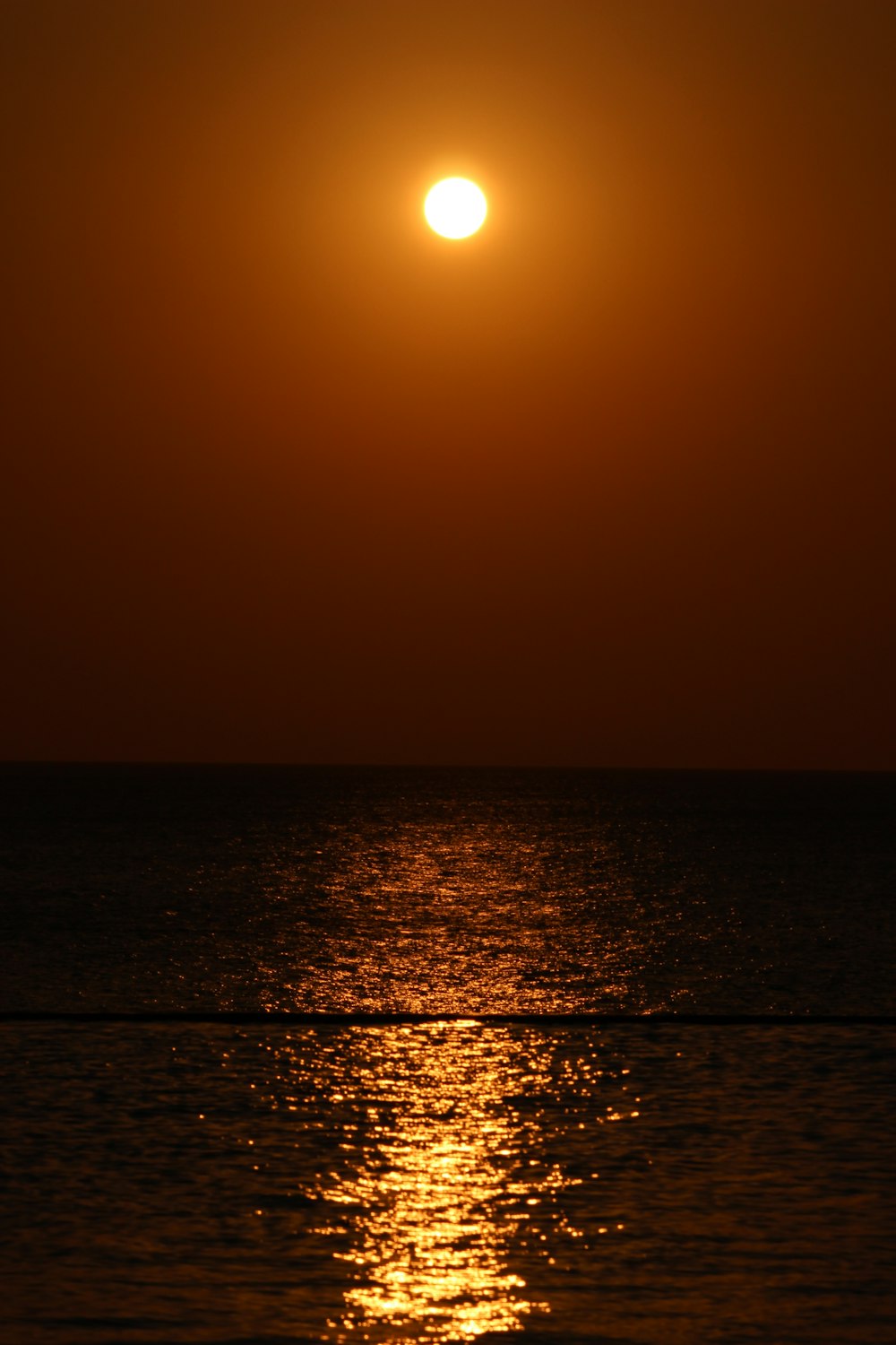 body of water during golden hour