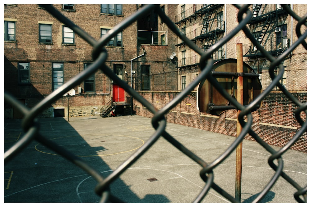 gray chain link fence during daytime