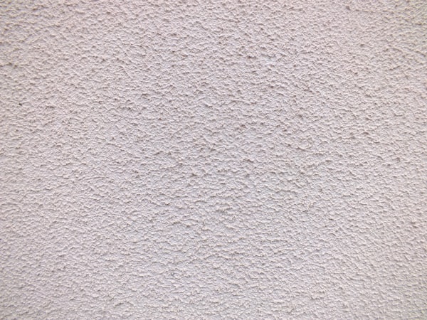 Close-up of smooth skim coat plaster finish