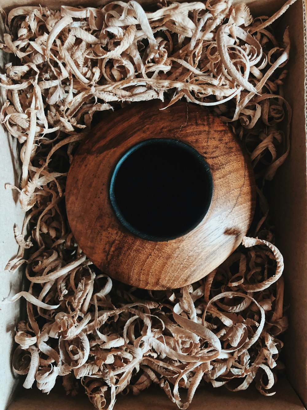brown vase inside box