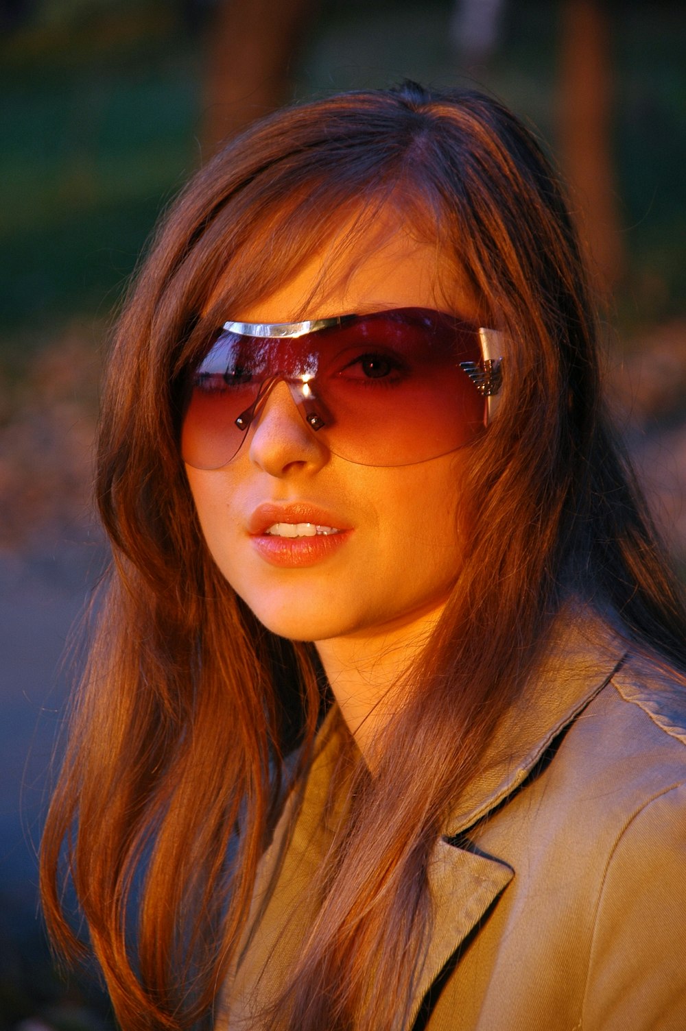 woman wearing brown sunglasses