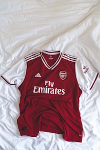 red and white Adidas Fly Emirates shirt
