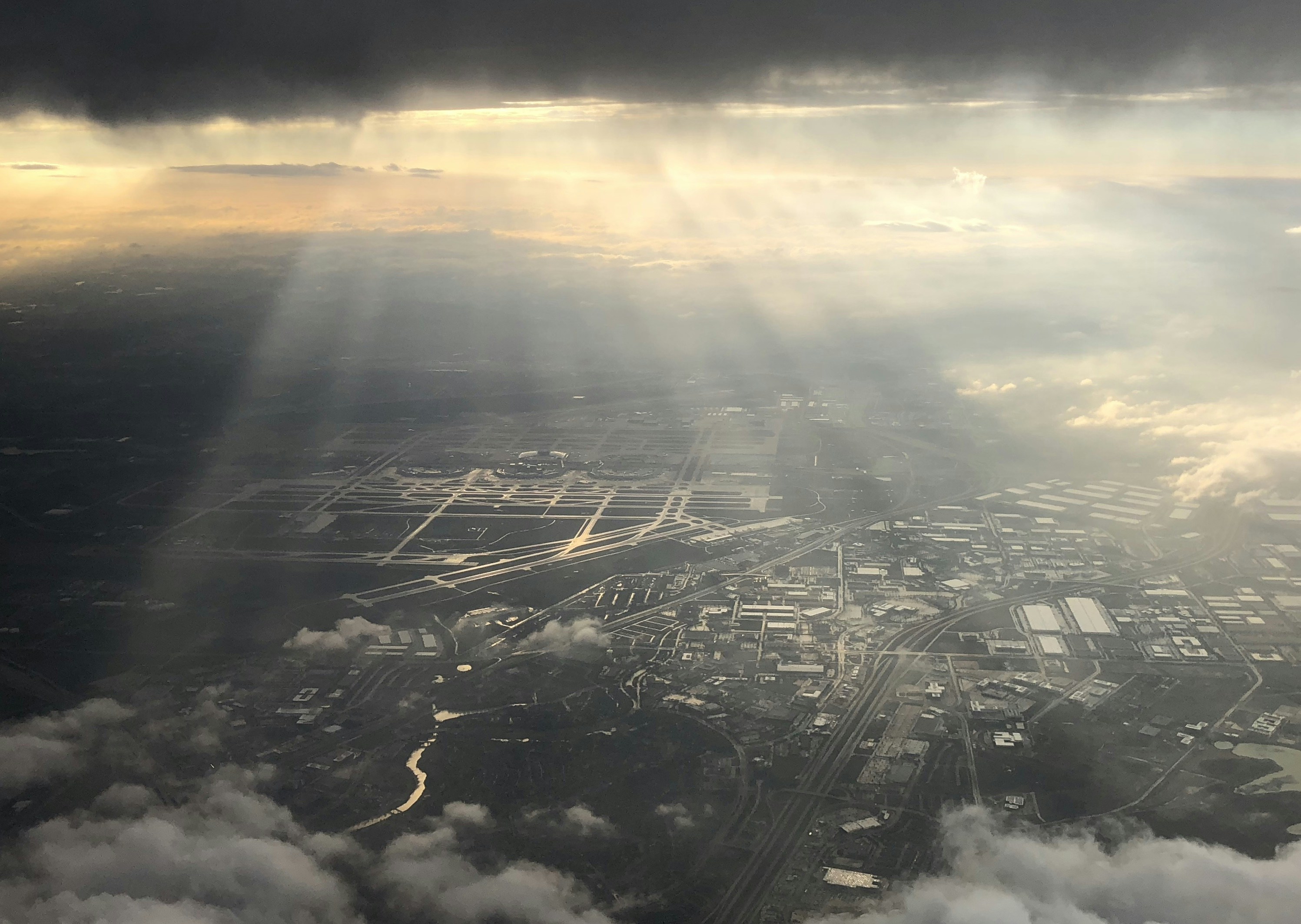 the sun shines through the clouds over a city, Heavenly Landing 