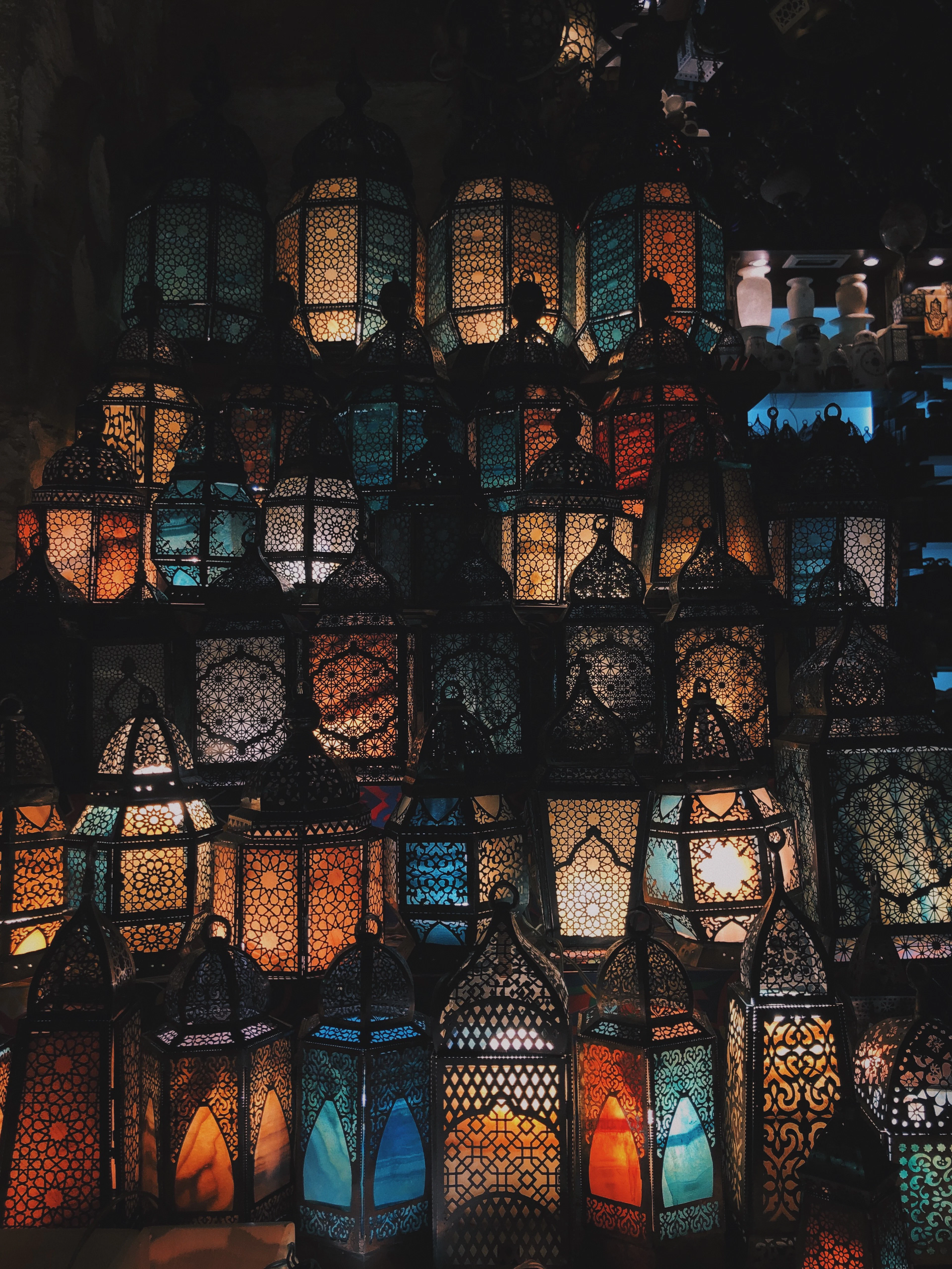 Rows of ornate lanterns glowing warmly