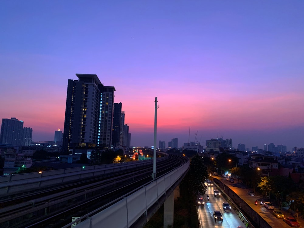 vehicles on road at golden hour