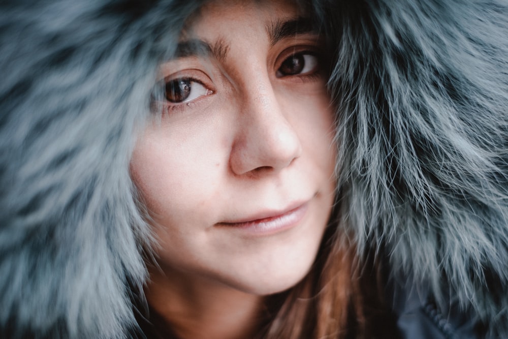 woman in gray fur coat