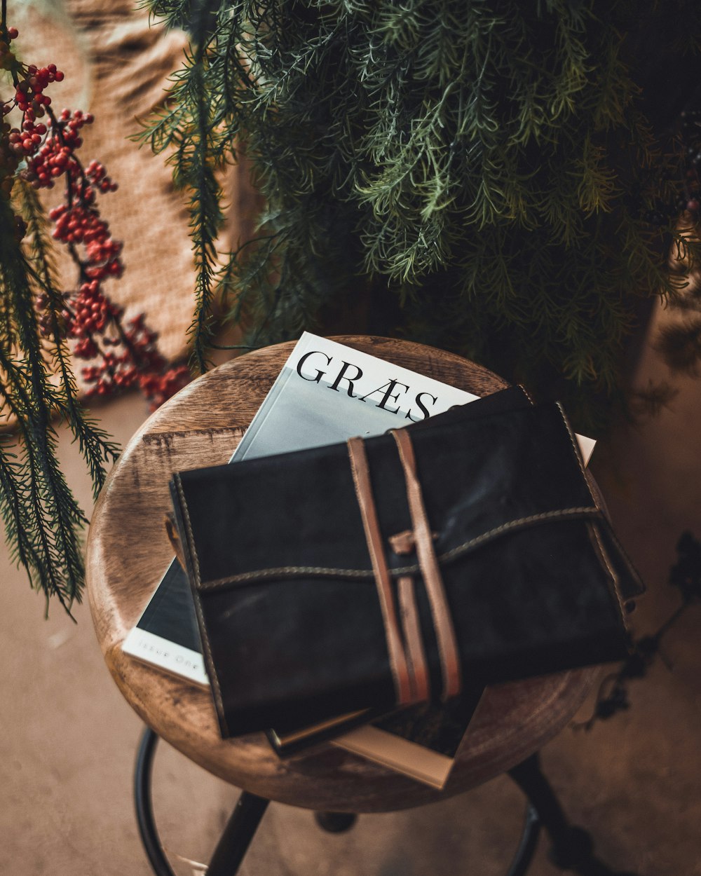 black leather bag on stool