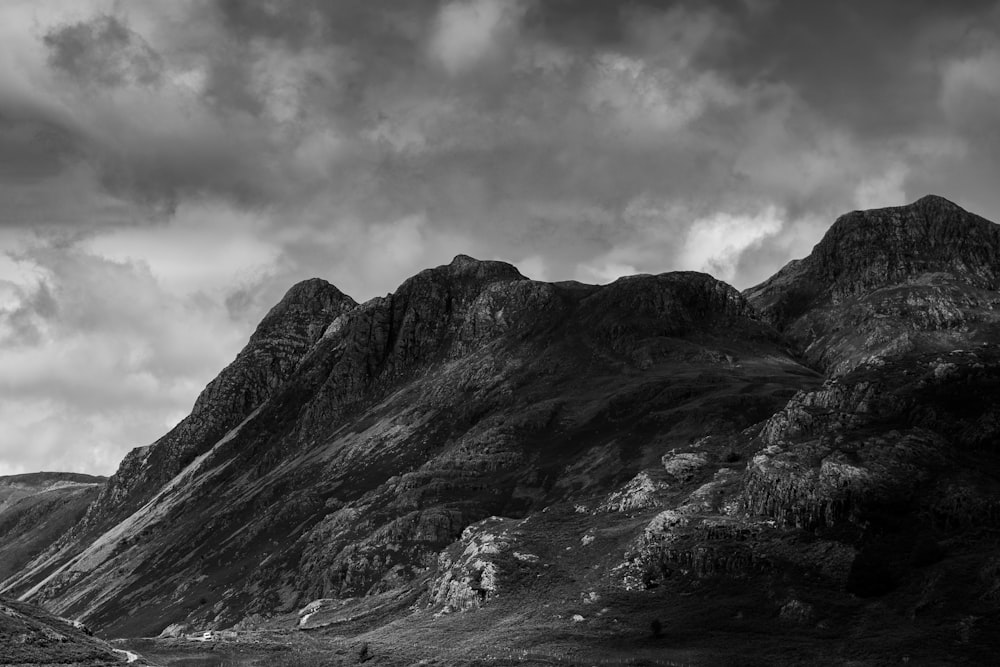 a black and white photo of a mountain range