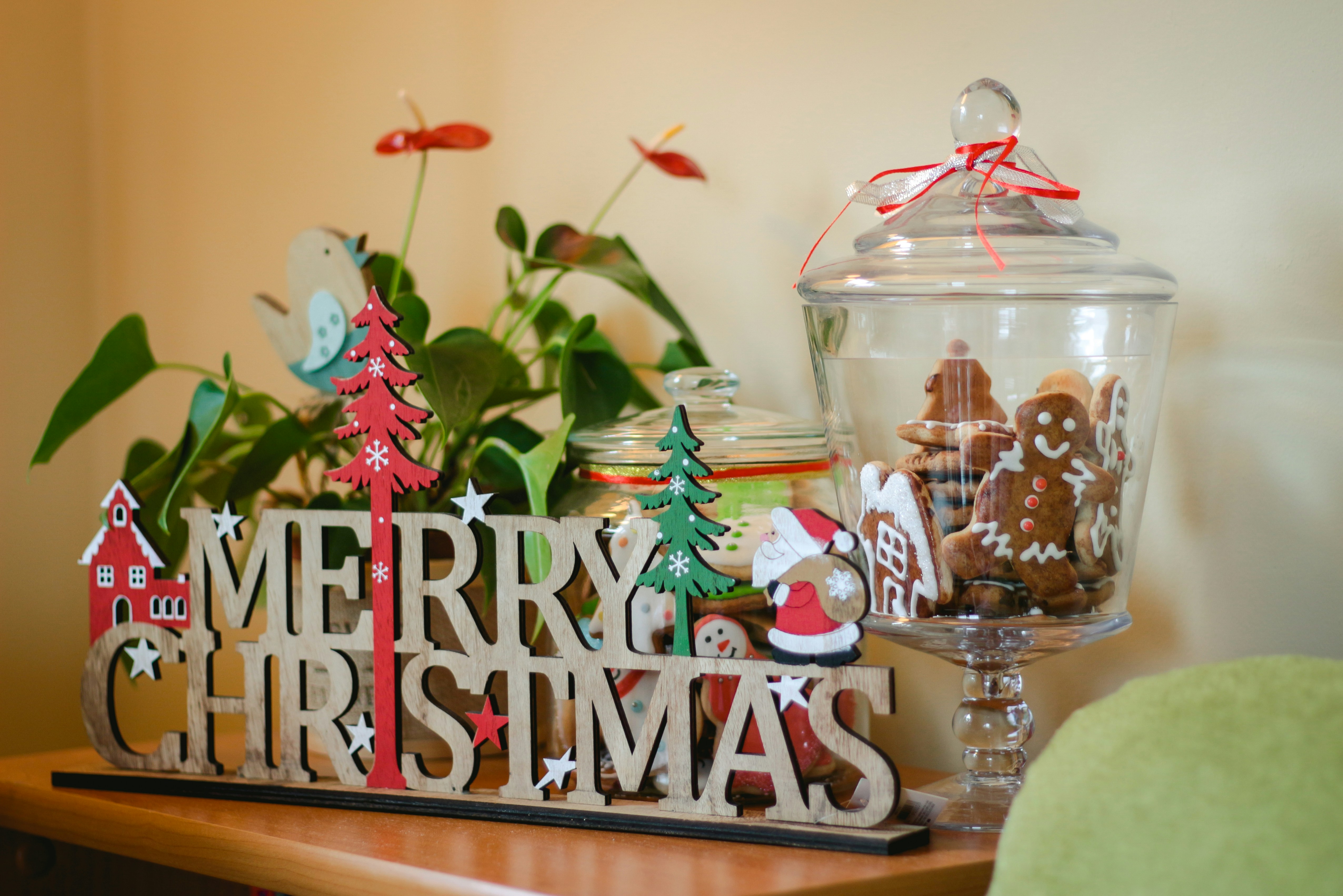 footed jar of cookies on side table