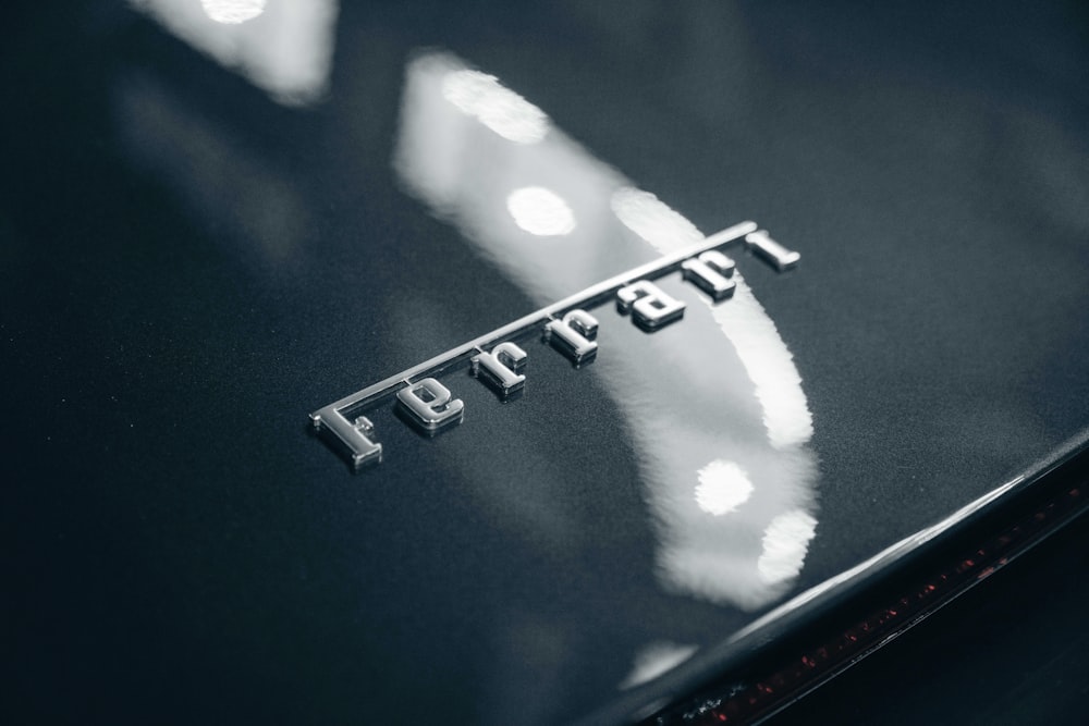 Ferrari emblem on gray surface