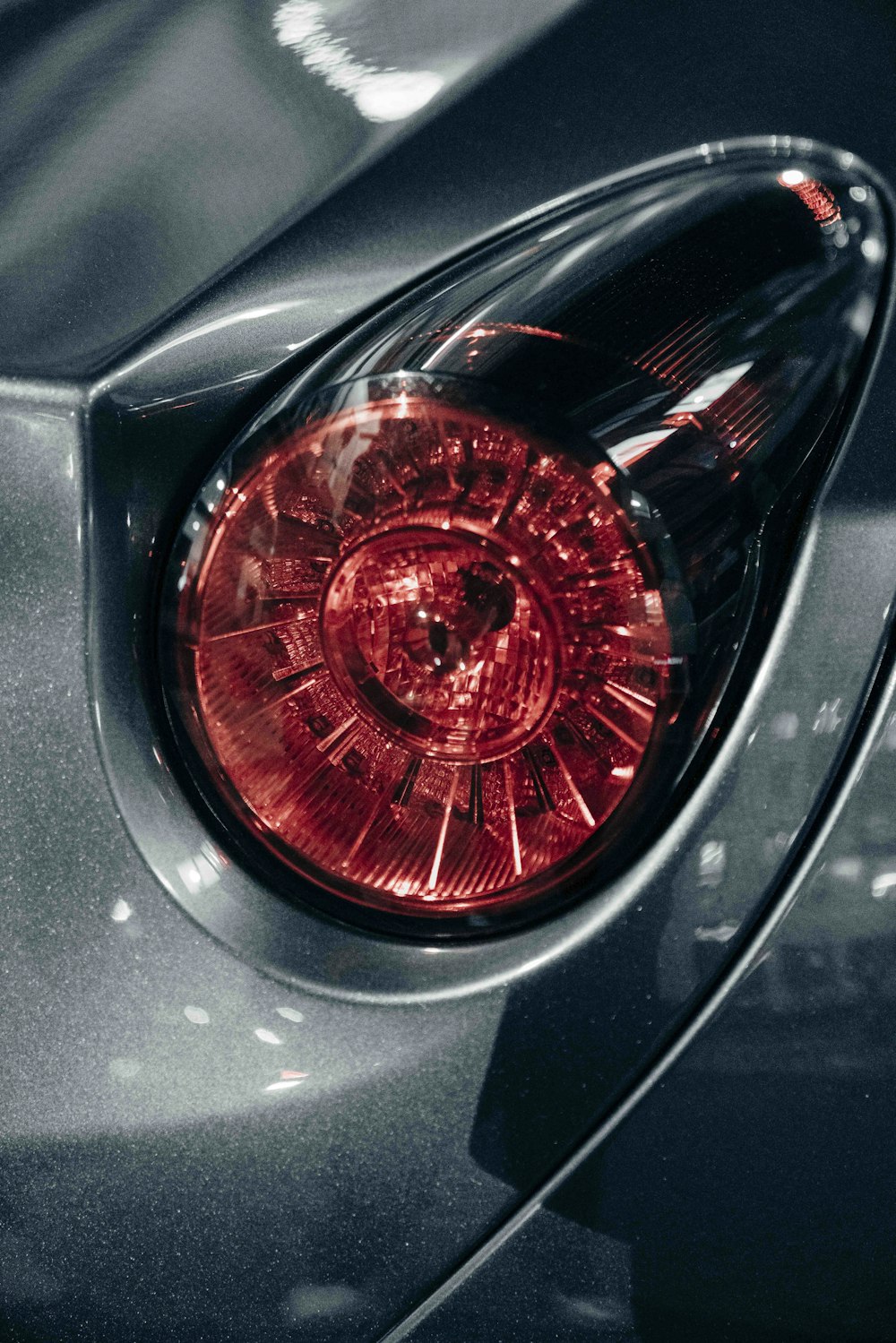 a close up of the tail light of a car